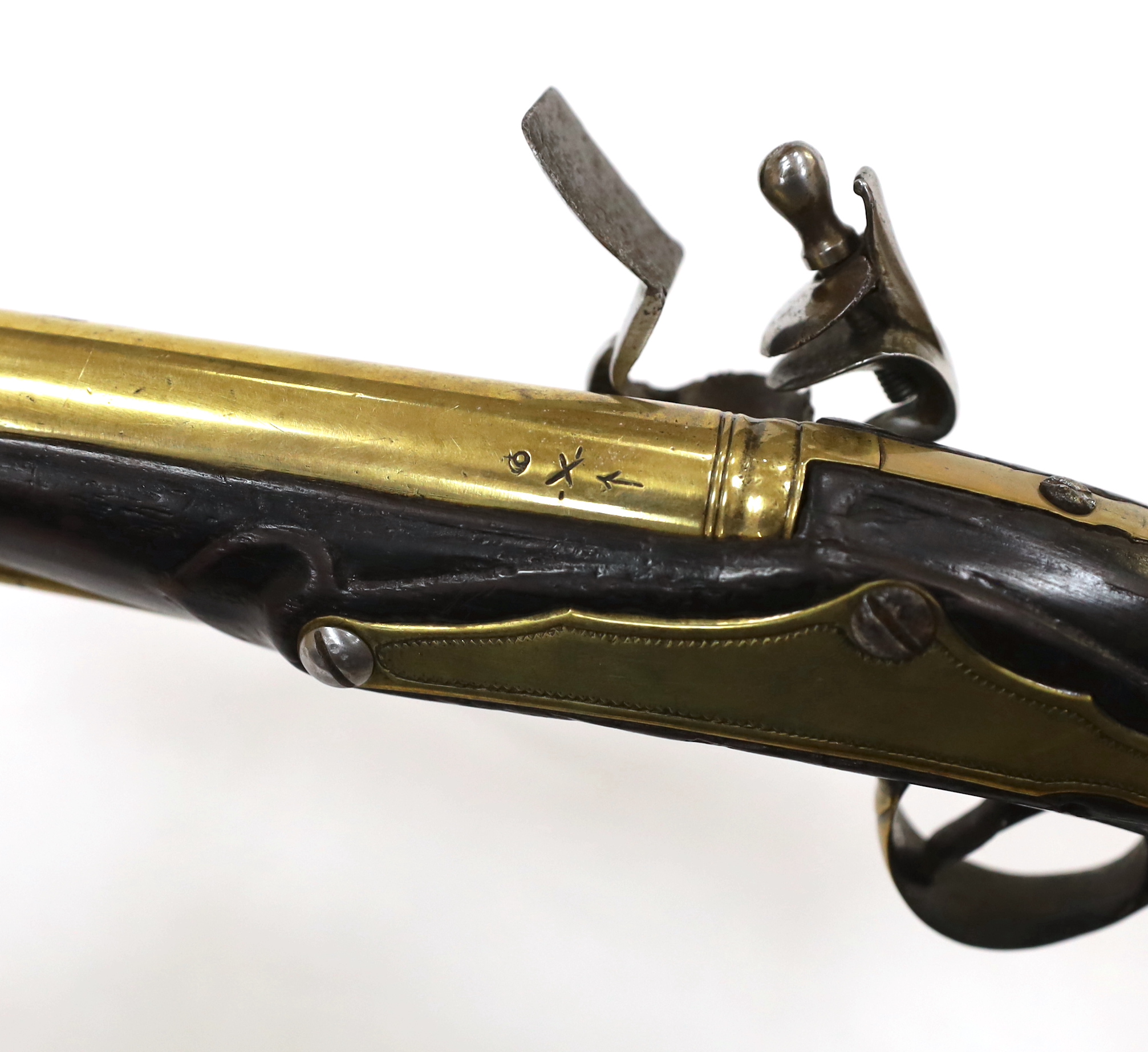 A composite 20 bore brass barrel, flintlock holster pistol, fitted with brass mounts, long spur butt cap and fully stocked